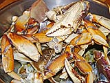 Raw Dungeness crab pieces w/cracked shells