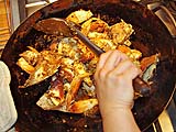 Stir-frying crab in garlic and spices